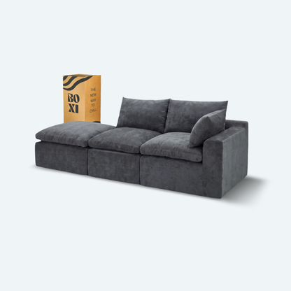 Sofá modular Cloud 2 plazas con 1 reposabrazos y pouf