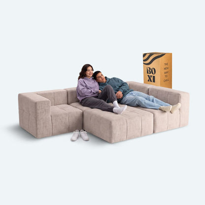 Sofá modular Bold 4 plazas con 2 reposabrazos y pouf