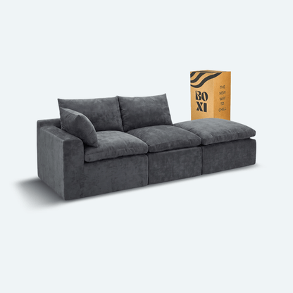 Sofá modular Cloud 2 plazas con 1 reposabrazos y pouf